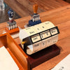 Vintage Rotating Perpetual Desk Calendar on the cafe