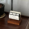 Vintage Rotating Perpetual Desk Calendar on the desk