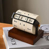 Vintage Rotating Perpetual Desk Calendar on the book