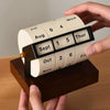 Vintage Rotating Perpetual Desk Calendar on the hand